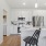 a kitchen with white cabinets