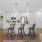a kitchen with an island and chairs