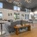 a clubhouse room with couches, chairs and tables