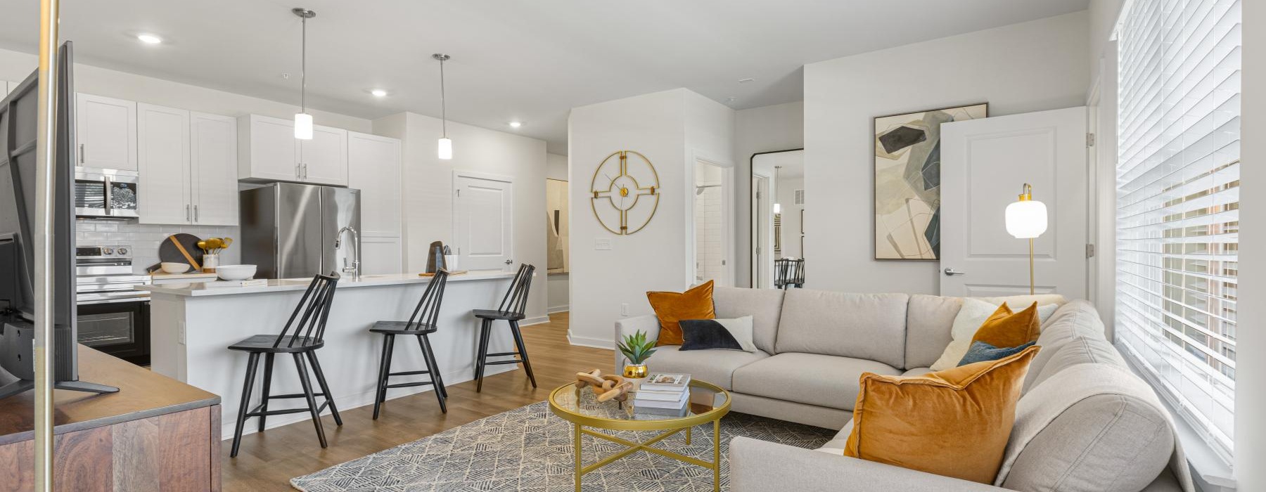 a living room with a couch and a table